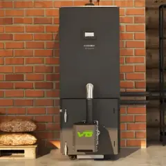 Nowoczesny piec na pellet z zielonym logo, obok palety z workami pelletu. Idealny do uzyskania dofinansowanie do pieca na pellet.